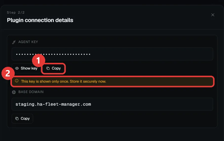 The connection details panel: the agent key marked, next to the note that it is shown only once